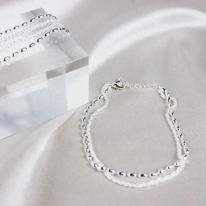 SET DI BRACCIALI IN ARGENTO CON DETTAGLI IN ZIRCONIA