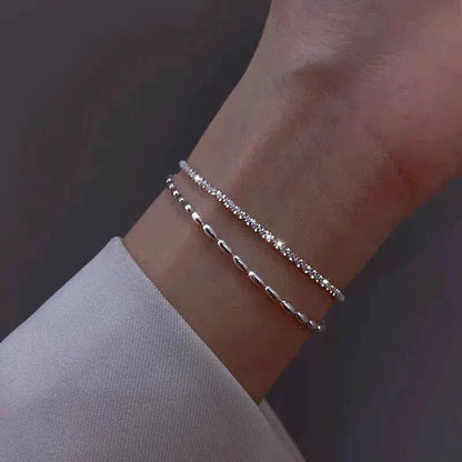 SET DI BRACCIALI IN ARGENTO CON DETTAGLI IN ZIRCONIA