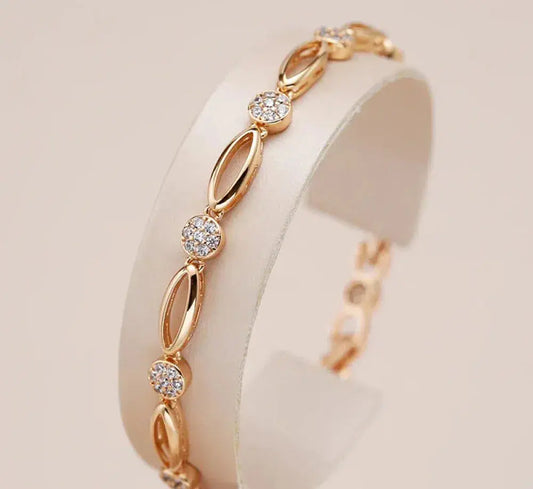 BRACCIALE CON ACCENTI IN ZIRCONIA ORO