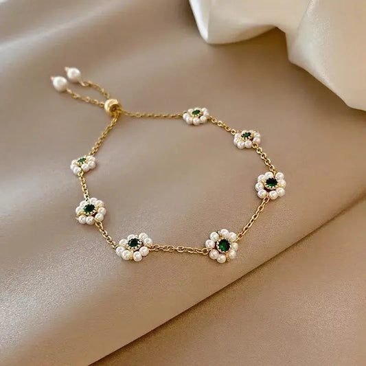 BRACCIALE IN ISPIRAZIONE DAISY CON CRISTALLI VERDI